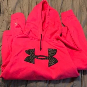 Bright pink UA hooded sweatshirt